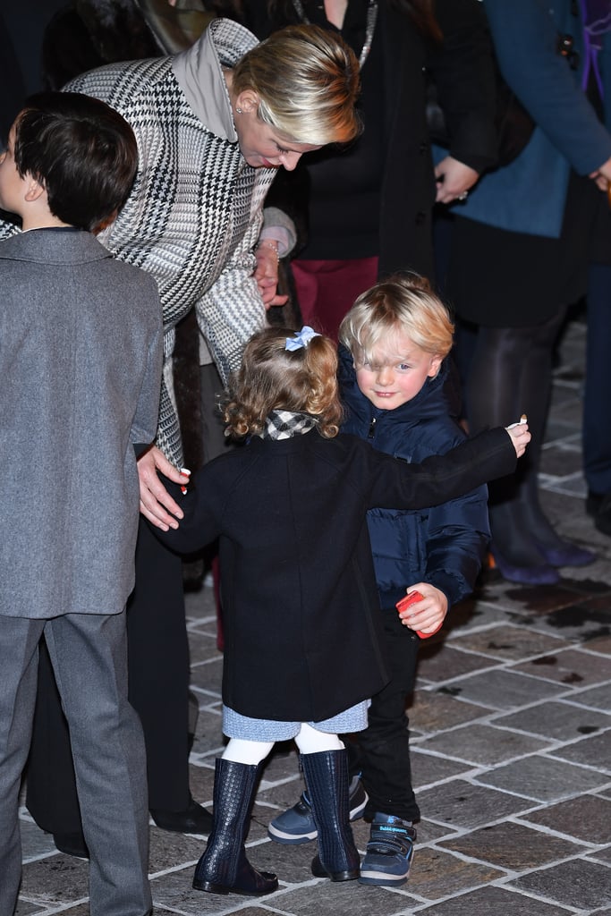 Princess Charlene was hands-on with the twins at an event in 2018.
