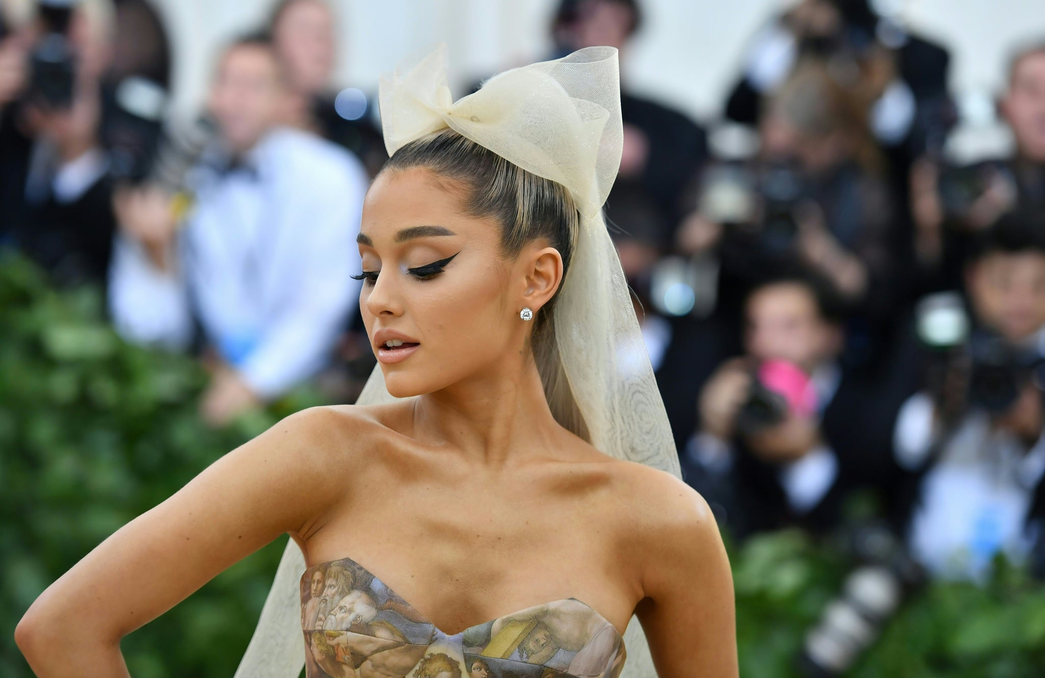 Ariana Grande arrives for the 2018 Met Gala on May 7, 2018, at the Metropolitan Museum of Art in New York. - The Gala raises money for the Metropolitan Museum of Arts Costume Institute. The Gala's 2018 theme is Heavenly Bodies: Fashion and the Catholic Imagination. (Photo by Angela WEISS / AFP)        (Photo credit should read ANGELA WEISS/AFP/Getty Images)