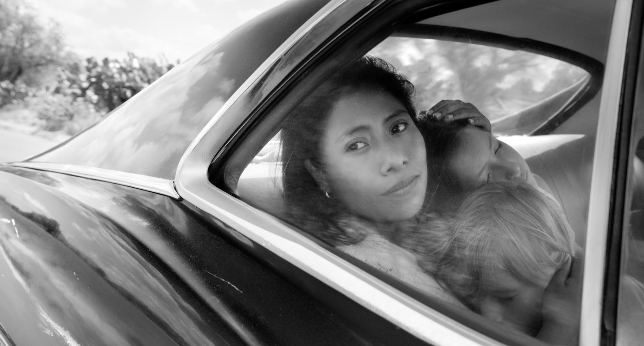 ROMA, Yalitza Aparicio (top left), Daniela Demesa (dark hair, right), Marco Graf (bottom right), 2018. ph: Alfonso Cuaron /  Netflix / courtesy Everett Collection