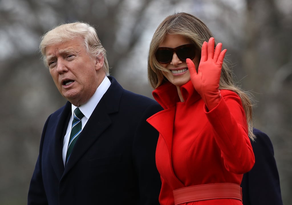 Melania's dark tortoise sunglasses were styled with a red coat and matching leather gloves to depart the White House for a weekend in Florida in March 2017.