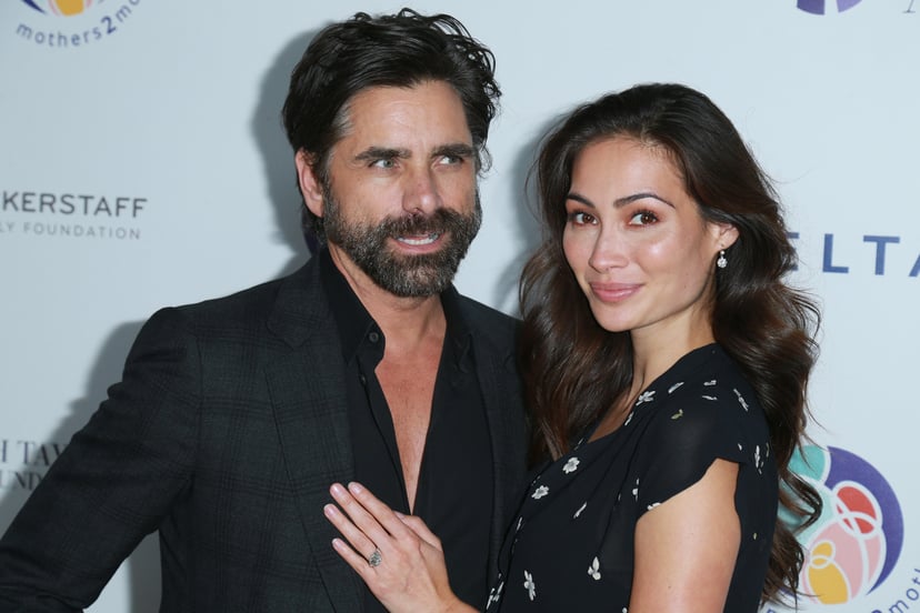 BEVERLY HILLS, CA - OCTOBER 24:  Actor John Stamos (L) and fiancee Caitlin McHugh attends the Zac Posen And Paris Jackson Host Event Supporting mothers2mothers And ETAF on October 24, 2017 in Beverly Hills, California.  (Photo by Leon Bennett/WireImage)