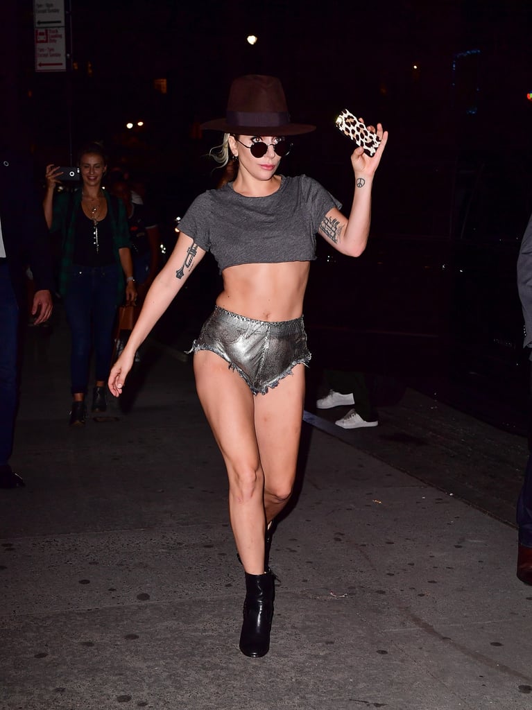 Lady Gaga celebrated the release of her latest music video, "Perfect Illusion," in the best way on Tuesday night: wearing what might be the world's smallest pair of shorts. As she strutted down the sidewalk in front of Electric Lady Studios in NYC, the rumored Super Bowl halftime show performer rocked some silver cut-offs and a gray crop top while greeting fans, looking more gorgeous than ever. Between the exciting music video, all of her recent body-baring ensembles, and her ubermysterious role in American Horror Story, it's safe to say Gaga has been having one incredible Fall so far.