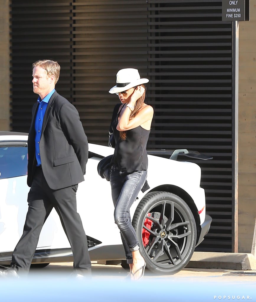 She added a watch and a few rings to her look and was also swinging a black leather bag.