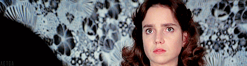 Although the wallpaper in the Suspiria scene in question is actually large flowers, and the Chilling Adventures version features black and white images of Charles Dana Gibson's Gibson Girl, it's easy to see where the set designers for the Netflix series got the idea from.