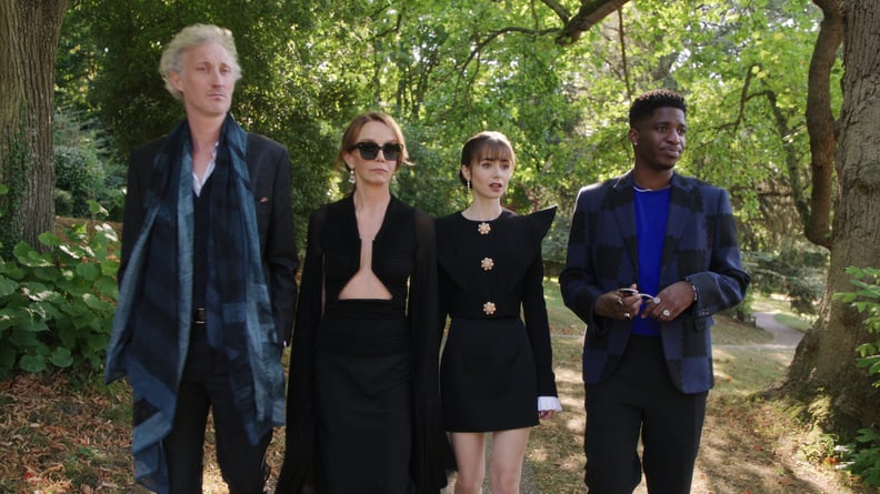 Emily in Paris. (L to R) Bruno Gouery as Luc, Philippine Leroy-Beaulieu as Sylvie Grateau, Lily Collins as Emily, Samuel Arnold as Julien in episode 308 of Emily in Paris. Cr. Courtesy of Netflix © 2022