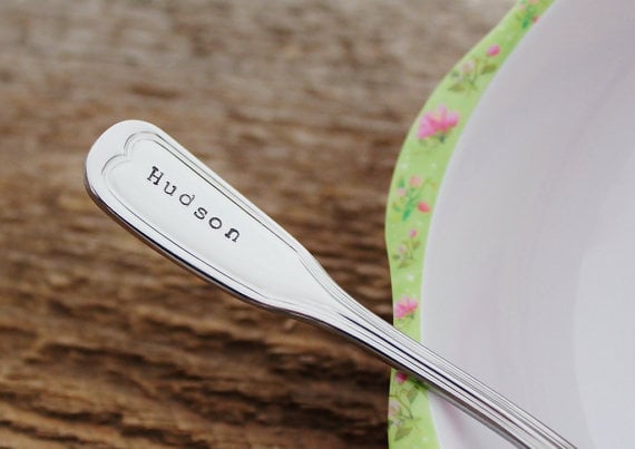 baby-sized stainless-steel spoon