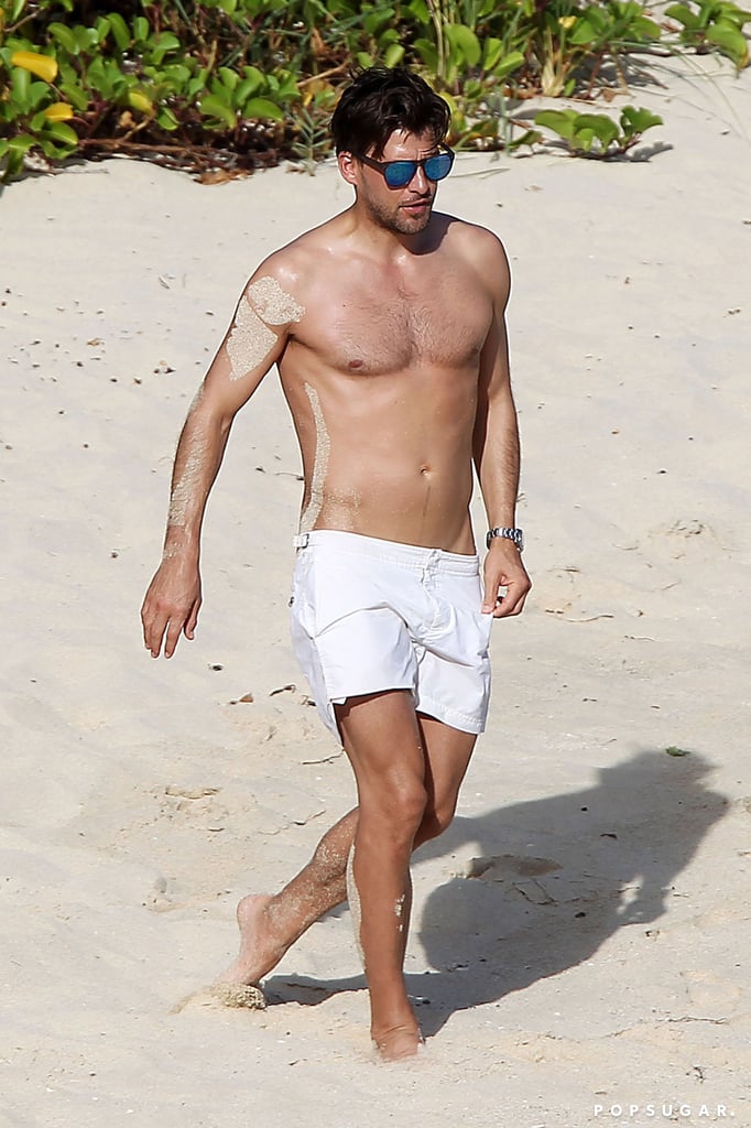 Johannes went shirtless during the couple's beach day.