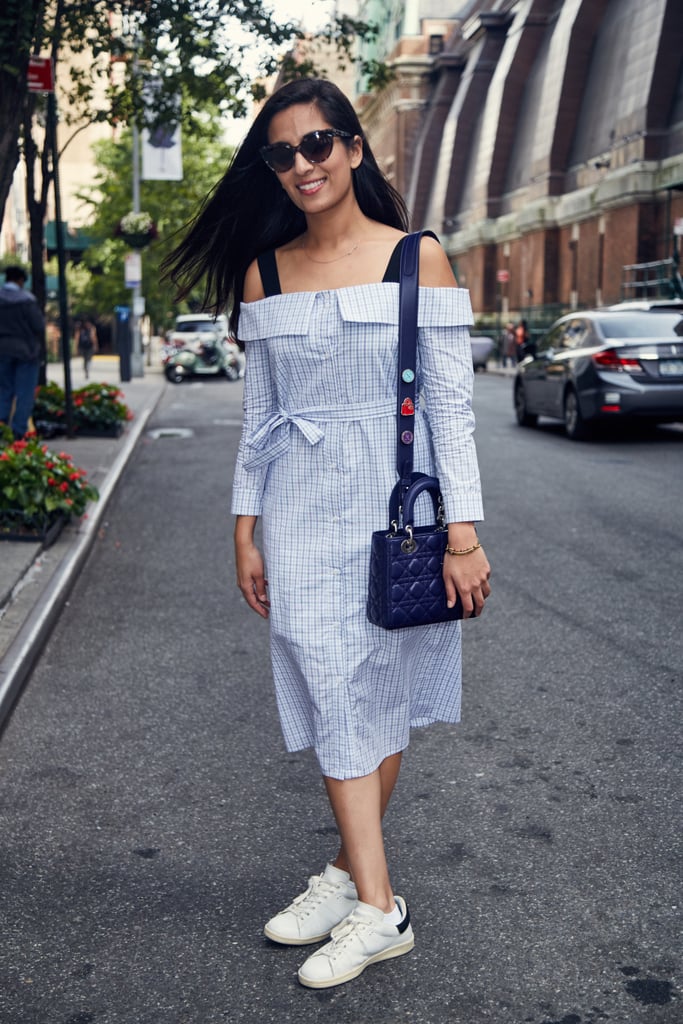 On Nikita: English Factory dress, Isabel Marant sneakers, and Dior sunglasses and handbag.