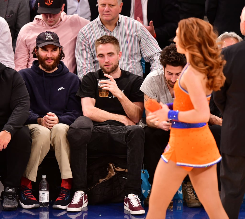 Robert Pattinson Watching Dancers at Knicks Game Nov. 2017