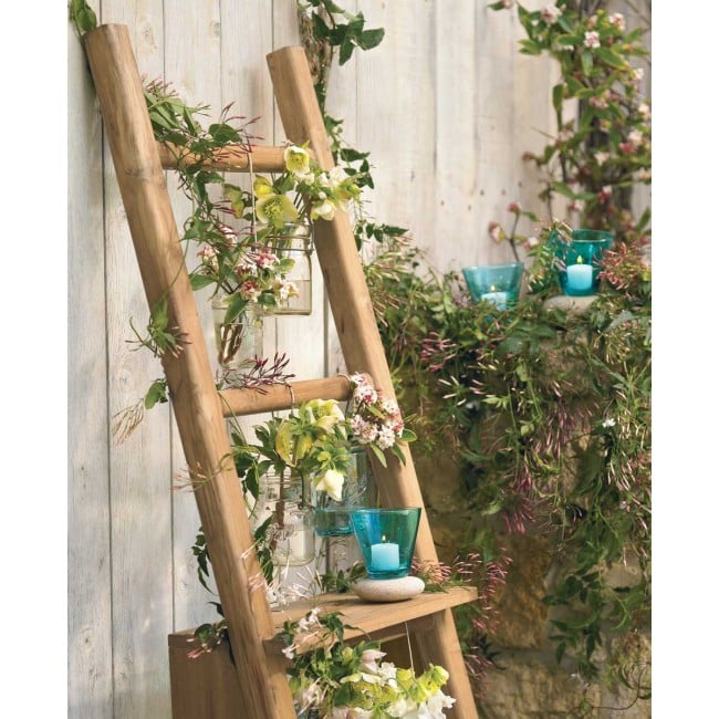 This teak ladder and shelf ($149) is a simple, but stylish organization option. You can hang planters on its many rungs and display candles on the shelf.