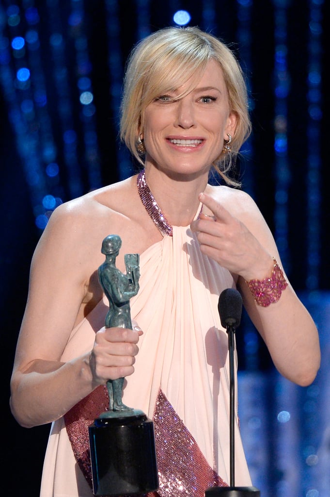 Cate Blanchett continued her winning streak at the SAG Awards in LA on Saturday. The actress made a solo arrival to the award show — we'll have to wait to see if she brings her adorable son Ignatius along to entertain her famous friends with magic tricks. Cate and Ignatius made a sweet mother-son duo at the Critics' Choice Awards on Thursday, where they buddied up with Sandra Bullock. Cate and Sandra went head to head in the outstanding performance by a female actor in a leading role category. Cate is up for her resonant portrayal of a woman whose life somewhat comedically falls apart in Woody Allen's Blue Jasmine, while Sandra is nominated for playing an astronaut lost in space in Alfonso Cuarón's Gravity. Ultimately, Cate took home the honor, making this her third-straight win. Keep reading to see all of Cate's latest pictures! If you think her look is a hit, vote in our fashion and beauty polls.