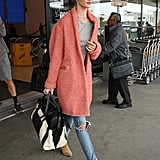 Style Your T-Shirt With: Jeans, a Coat, and Boots