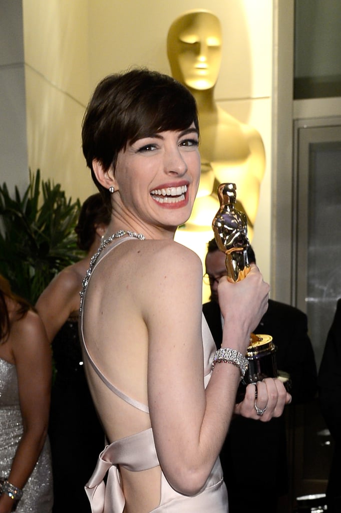 Anne Hathaway posed with her Oscar at the Governors Ball.
Anne Hathaway posed with her Oscar at the Governors Ball.
