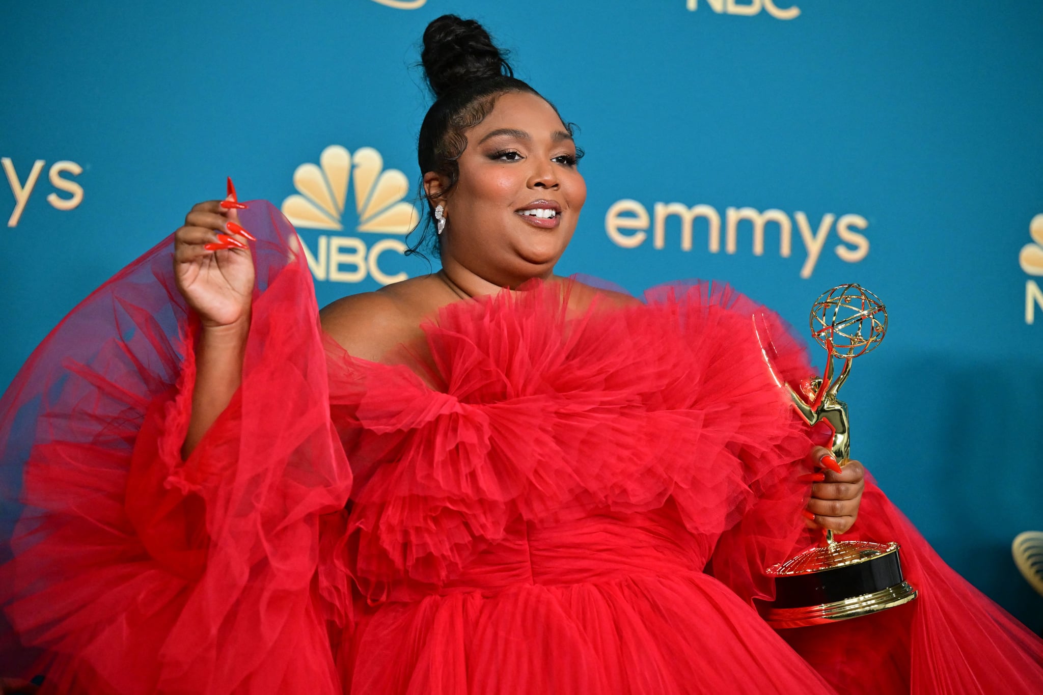 US singer-songwriter Lizzo poses with the Emmy for Outstanding Competition Program for 