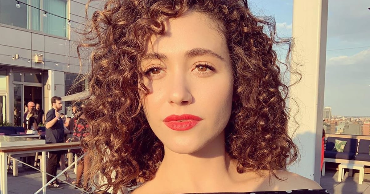 Emmy Rossum is embracing her curls! 