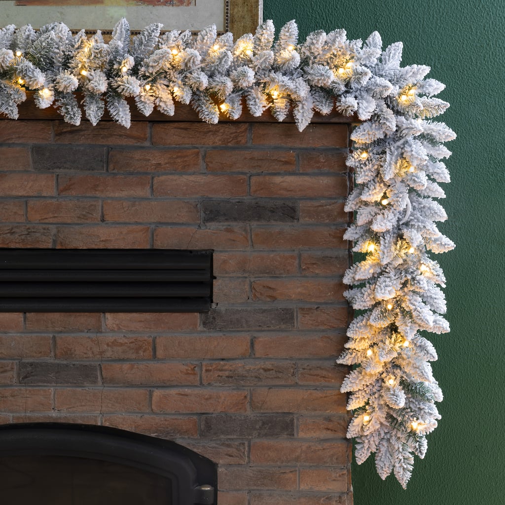 Glitzhome Pre-Lit Snow Flocked Christmas Garland, with Warm White LED Light