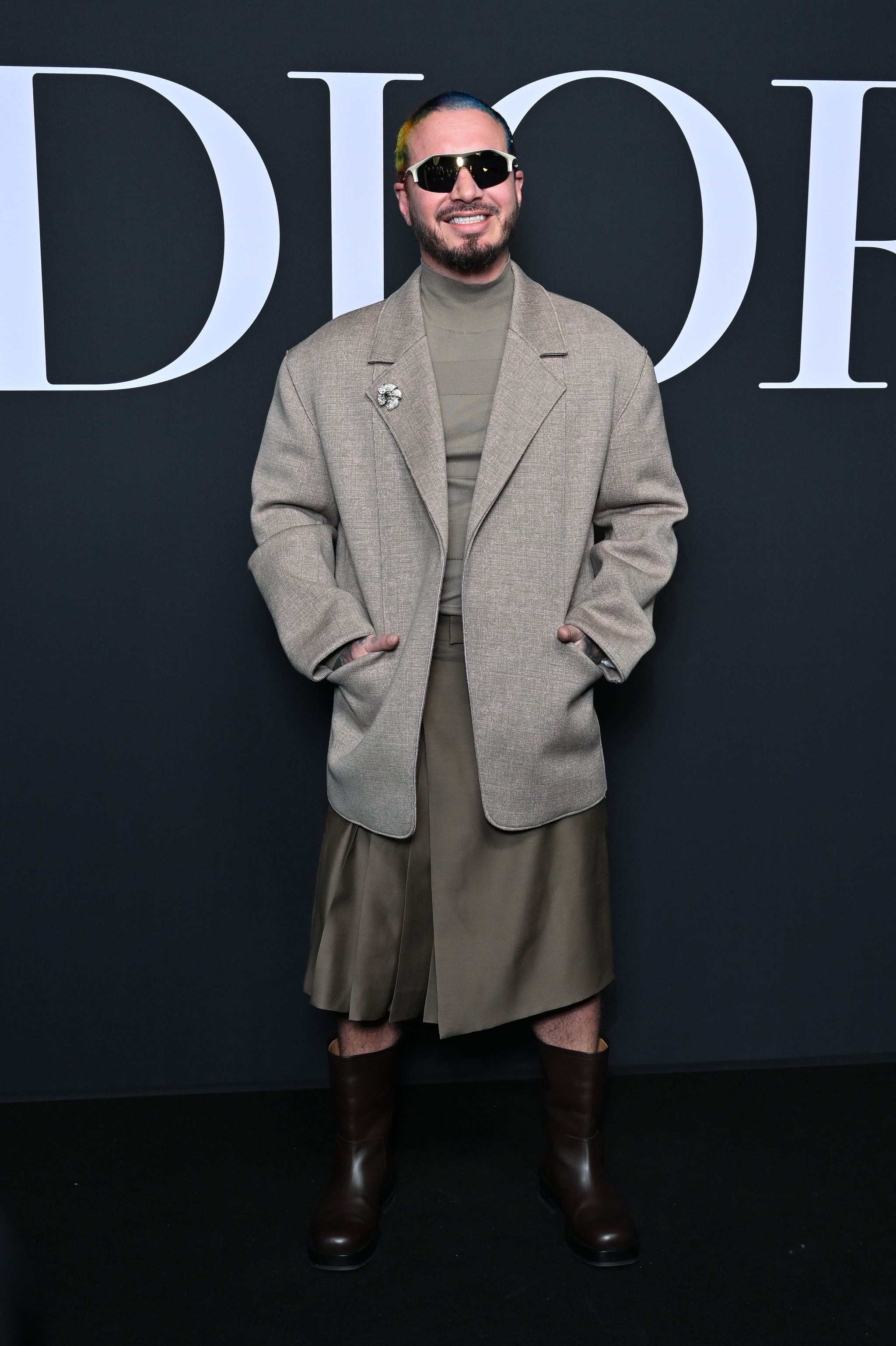 J Balvin at the Dior Homme Menswear Fall 2023 Show, Heartstopper's Kit  Connor Cements his Fashion Status at the Loewe Show in Leather Joggers