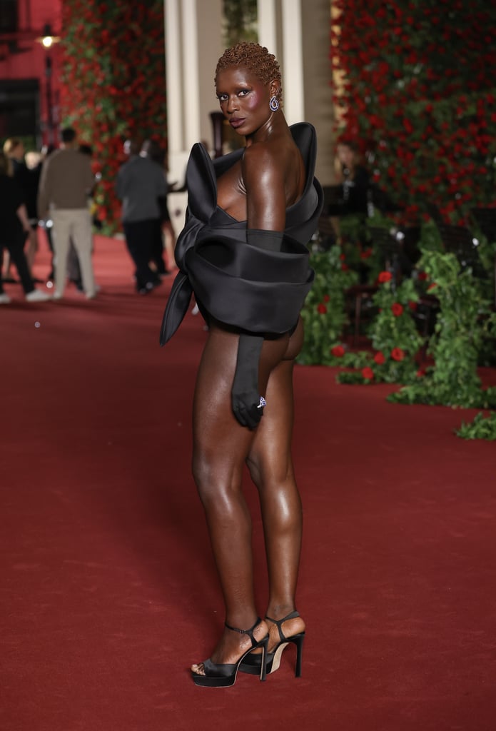 Jodie Turner-Smith Wears Giant Bow and Thong to Vogue World]