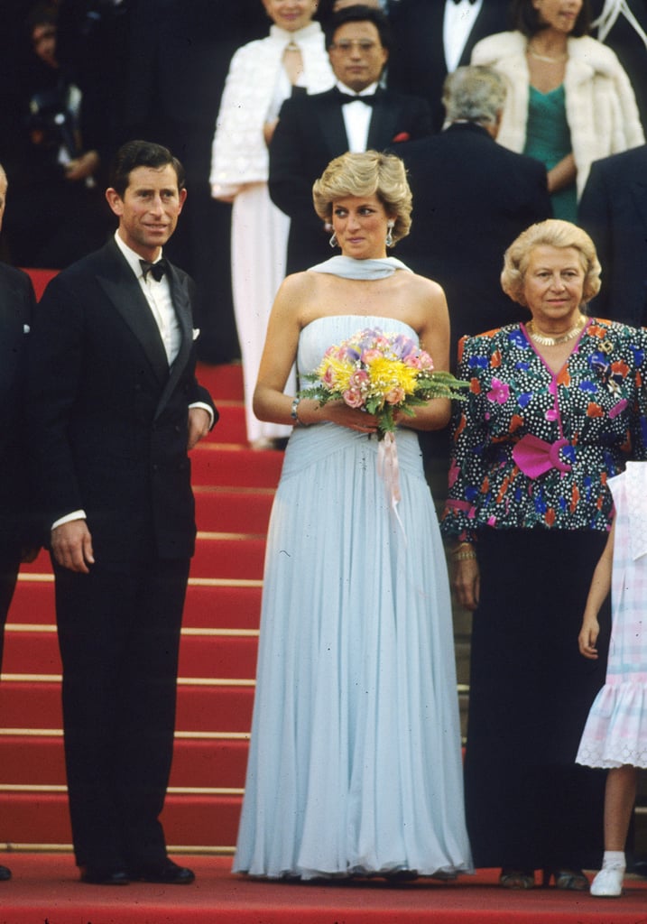 Princess Diana chose a simple blue chiffon dress by Catherine Walker for the festival in 1987. It was reportedly meant as an homage to a gown Princess Grace of Monaco wore in Alfred Hitchcock's To Catch a Thief.