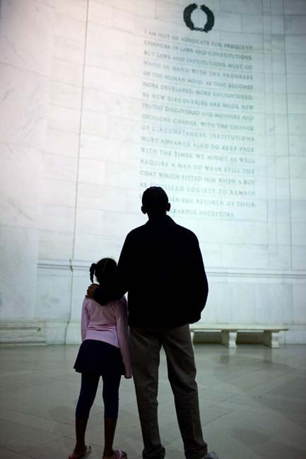 Obama and Sasha reading one of Thomas Jefferson's speeches together at the Jefferson Memorial.