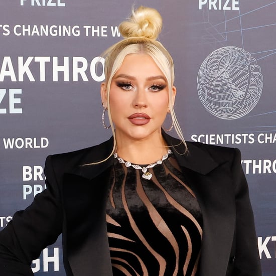 Christina Aguilera Wears Sheer Zebra-Print Versace Catsuit