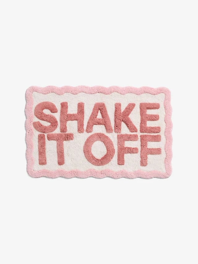 Next Pink Shake It Off Bath Mat ($34)
Sometimes all you need to seize the day is a motivational message right after you step out of the shower. This plush bath mat not only catches excess moisture as you dry off, but it will add a bit of personality to your personal space. Fully lean into the peachy-pink color scheme and buy a matching set of Pink Dusky Egyptian Cotton Towels ($26).