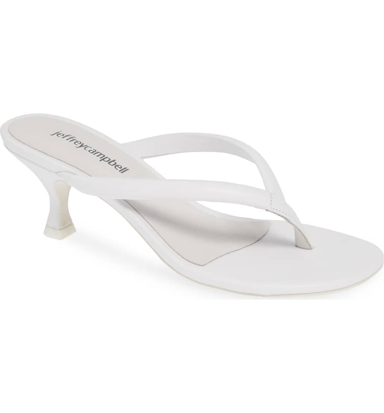However, if you're looking to try something a little less casual, opt for kitten heels ($110). All it takes is white leather and a little added height and suddenly you've got a sleek and elegant look.