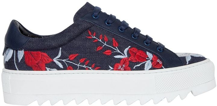 Denim material + floral accents + platforms = a fashionable triple whammy. These Salvatore Ferragamo Embroidered Denim Sneakers ($600) are as chic as can be.