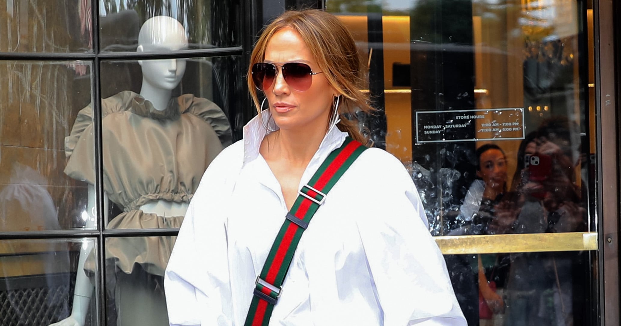 Jennifer Lopez Rocks Oversized Button-Up, Biker Shorts in NYC