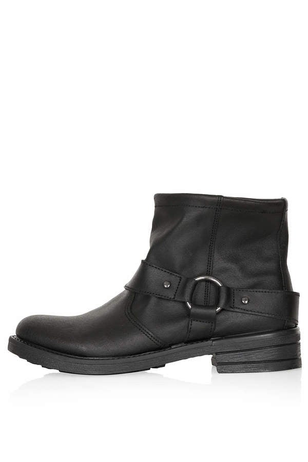 Since she never knows just where she's headed next, she always could use a cool pair of boots. Gift her these Topshop biker boots ($75), which can take her look from sweaty to sultry.
