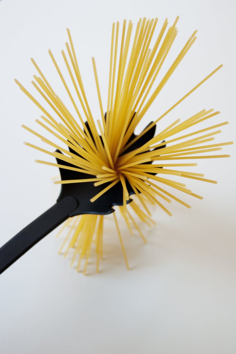 Use your spoon to measure portions of spaghetti.