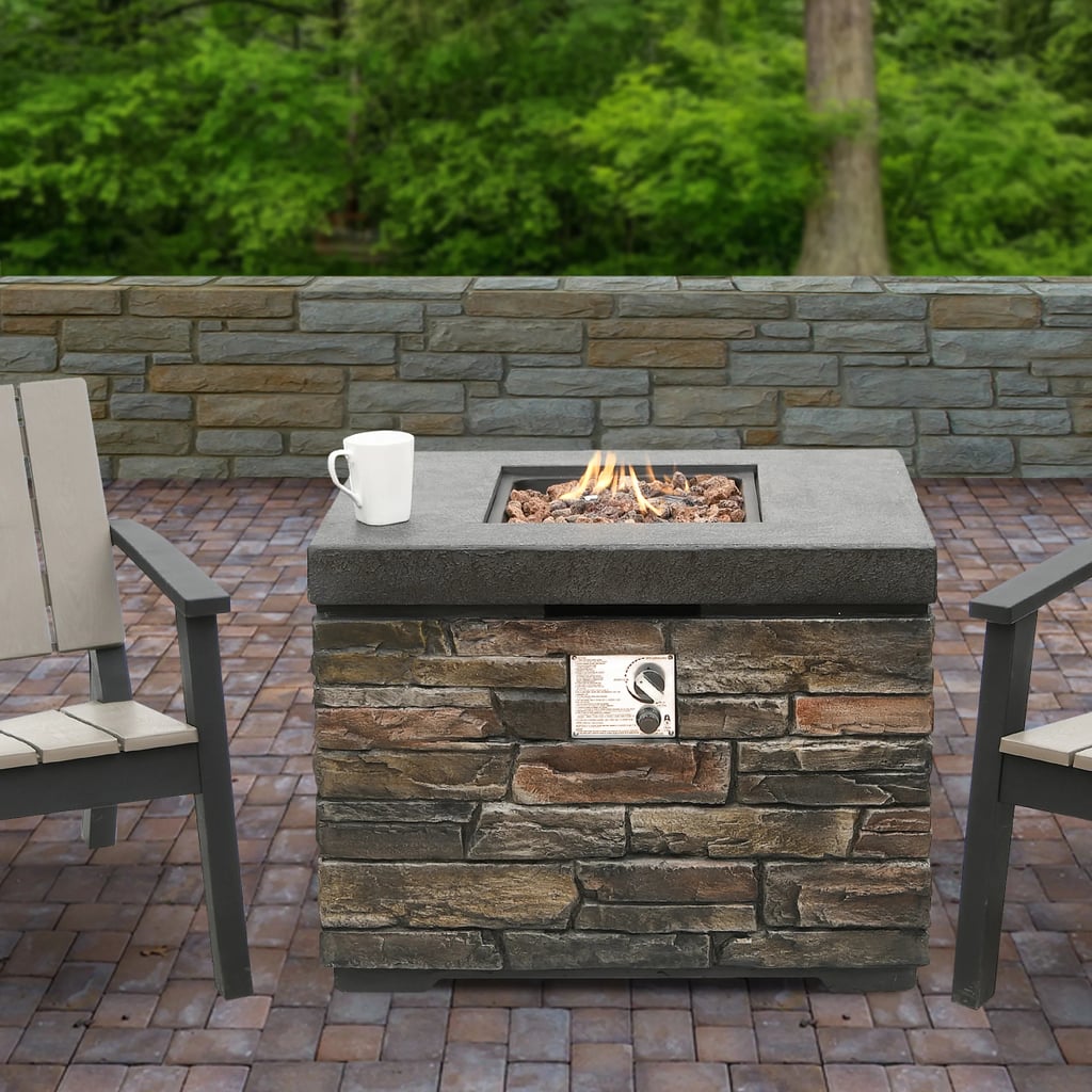 A Natural Stone Vibe: Foundstone Romano Stone Propane Outdoor Fire Pit Table with Lid