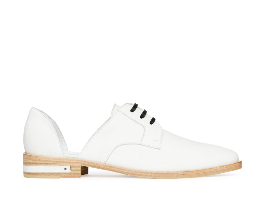 PS: Is there a style you find that now you can't keep in stock? Your bestselling shoe?
CPN: Our bestseller would for sure be this style [points to Keen mules], whether it's, like, the white or the black: the mule. I think our first one that really put us on the map, I would say, like, the d'Orsay-shaped loafer.
MP: We're definitely a loafer/flat brand.
PS: What's your ideal travel shoe? What style are you wearing when you're traveling?
MP: Any loafers, honestly; you can get in and out so quickly. 
CPN: Also, like, house slippers — easy, too.
MP: I've been wearing these [points to True mid-heel boot in gold]. They're so easy. Once you get past the fact that they're shiny gold, they're kind of a neutral, right? It's like, people need to get over leopard print . . . it's basically a neutral.