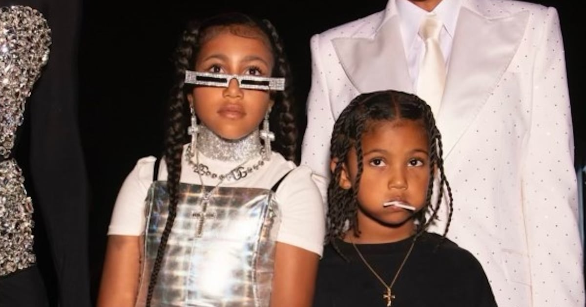 North and Chicago West Matched in Shiny Overalls and Crystal Tops in Milan