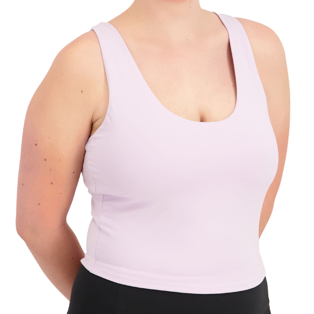 PS by Popsugar Evolve Crop Tank Top ($22)
A "crop tank" or a "sports bra" — whatever you want to call it, we've seen Taylor Swift wear her fair share of these tank-bra hybrids while training for the Eras Tour. So yes, creating an affordable, accessible version of our own was a top priority. It pairs perfectly with high-rise leggings (keep scrolling for those).