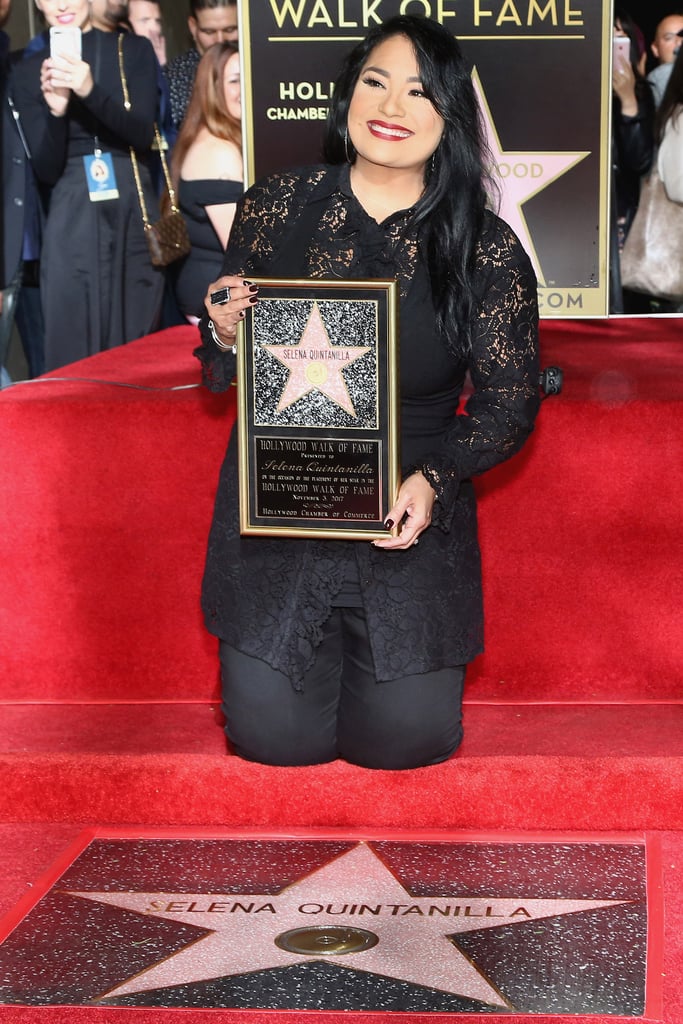 On Friday, Selena Quintanilla finally received her star on the Hollywood Walk of Fame, and we can't contain our excitement. The late singer was honored with the 2,622nd star, which is located in front of the historic Capitol Records Building. It was a moment that Selena's family and fans have been waiting years for. "The Hollywood Walk of Fame honor is the only award which fans can share with their favorite icons," said Ana Martinez, producer of the Walk of Fame ceremonies. "Without a doubt Selena's star will be experienced by millions of her loyal fans for years to come!"
Eva Longoria, who was born and raised in Corpus Christi, TX, just like Selena, was a guest speaker at the ceremony and also opened up about her connection to Selena. "This star is for every Latina who has ever had a dream. Growing up there was no reflection of me anywhere . . . It was as if someone like me didn't exist in American mainstream and that all changed when a bright young singer named Selena changed the landscape of music entertainment, inevitably changing my own journey," Eva said, holding back tears. "She was the face I finally saw that looked like mine. She validated my existence and she validated to the world that we existed. Us, Mexican-Americans."
In addition to her star, Nov. 3 has officially been declared Selena Day in the city of Los Angeles. Selena's family, including her sister, Suzette, and her mother, Marcella, were front and center at the event and took the time to remember the beloved star. "It's like Selena said, 'The goal isn't to live forever but to create something that will,' and I think tonight is a perfect testament of that," Suzette said.
Selena's widower, Chris Perez, took the time to pose for photos with Selena's family and their old band, Los Dinos. The couple famously eloped without telling her family in April 1992. On March 31, 1995, Selena tragically passed away just days before what would have been their three-year anniversary.
Twenty-two years after Selena's death, her legacy continues to live on. A long-awaited MAC collection was released in October 2016 using products from her very own makeup bag, and who could forget the classic biopic starring Jennifer Lopez as the lead from 1997? Selena has also become a permanent part of an exhibit at The National Museum of American History in Washington DC. Keep reading to see more photos from the emotional Walk of Fame ceremony ahead.
— Additional reporting by Terry Carter

    Related:

            
            
                                    
                            

            12 Quotes From Selena That Will Make You Fall in Love With Her Even More