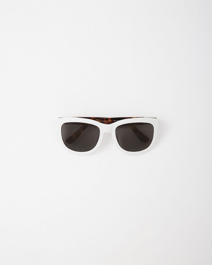 The Row White Frame Tortoise Sunglasses ($390)