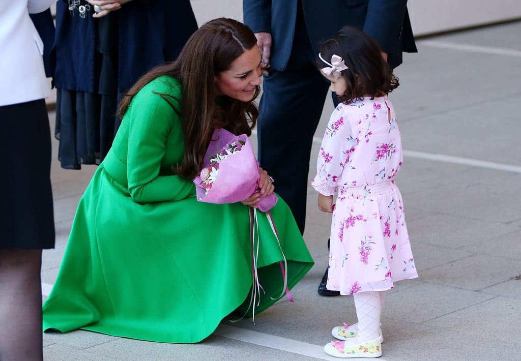 She was sweet and patient with a little girl who offered her flowers at Australia's National Portrait Gallery in April 2014.