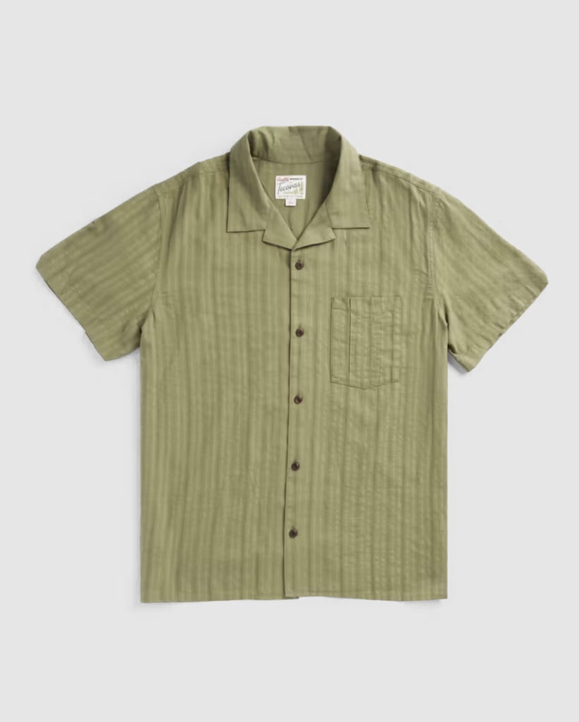 Tecovas Men's Dobby Camp Shirt ($95)
If a traditional T-shirt feels too casual, a short sleeve button-down will add an extra level of sophistication. This breathable cotton fabric holds up to summer heat and can be worn alone or over an undershirt as a light layer.