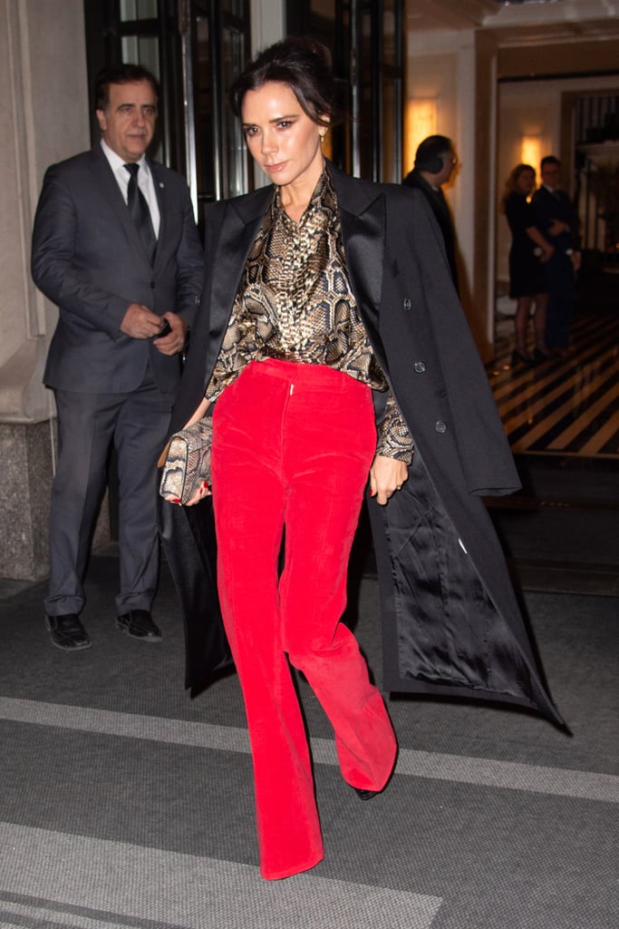 Victoria Beckham Red Pants and Snakeskin Blouse January 2019