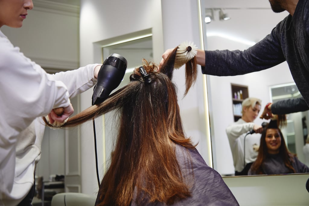 After getting a quick cut and blowout, my mane was transformed from the former dead brassy brown to a deeper warm-brown hue reminiscent of coffee and gingerbread men.
