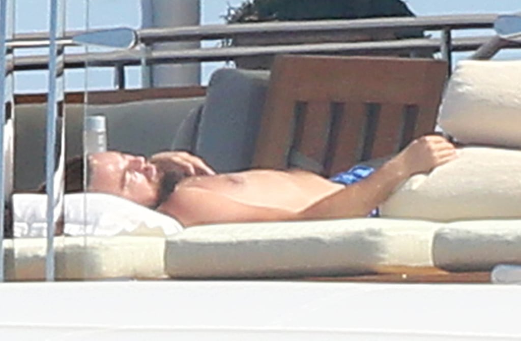 On Tuesday, Leo soaked up the sun shirtless.