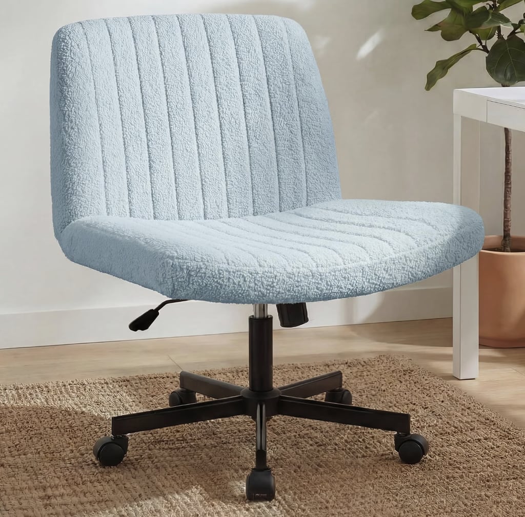 Orange Factory Criss Cross Chair With Wheels ($108)
Wide crisscross chairs blew up on TikTok Shop during the pandemic, and I totally understand why (comfort!). I'm happy to see that this style of chair has now expanded in color palette with this sky blue bouclé-like fabric iteration. A Cinnamoroll throw blanket would complete the look.