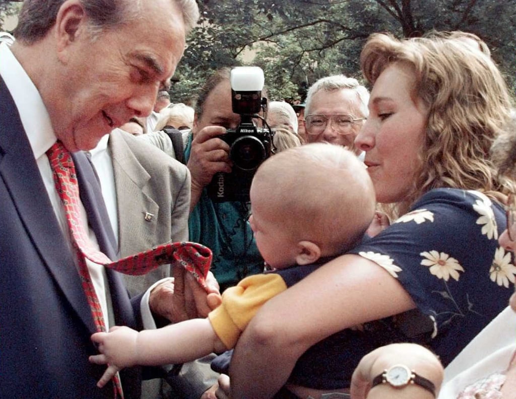 A baby reached for presidential candidate Bob Dole's tie during a stop in Birmingham, AL, during the 1996 campaign.
A baby reached for presidential candidate Bob Dole's tie during a stop in Birmingham, AL, during the 1996 campaign.