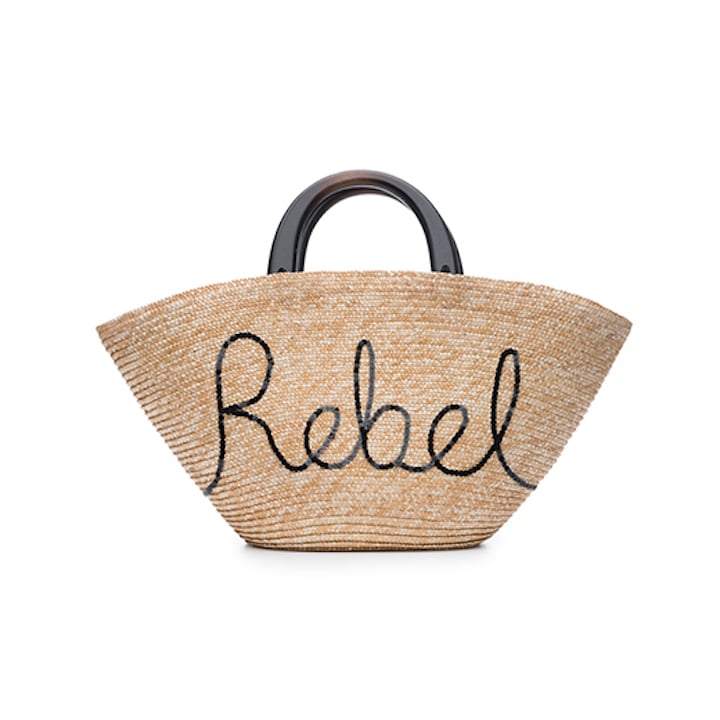 "With my trip to California right around the corner, I've been looking for a cute beach bag that fits everything I need and more. This Eugenia Kim Carlotta bag ($475) has 'rebel' hand-embroidered in black sequin on the front and features black wood handles." — NR