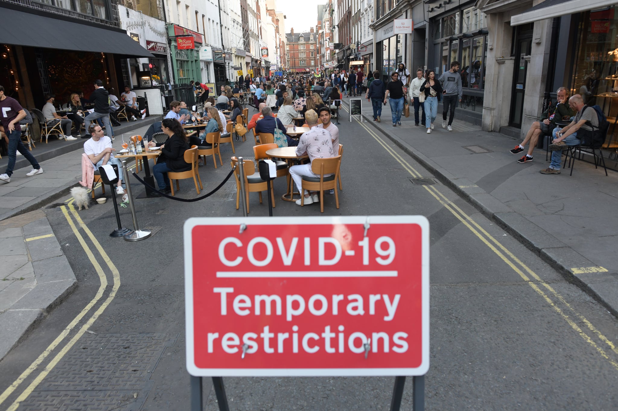 People socialising in Soho, central London, after the lifting of further coronavirus lockdown restrictions in England. Revellers are urged to remember the importance of social distancing as pubs gear up for the second weekend of trade since the lifting of lockdown measures. (Photo by Stefan Rousseau/PA Images via Getty Images)