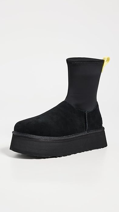 UGG Classic Dipper Women's Boot in Black (£170)
While stars have been reaching for the chestnut iteration, the Dipper boots also come in a tried-and-true black colourway. If your wardrobe leans more polished or edgy, opt for this version of the shoe.
