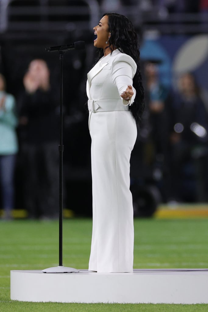 Demi Lovato's White Sergio Hudson Jumpsuit at the Super Bowl