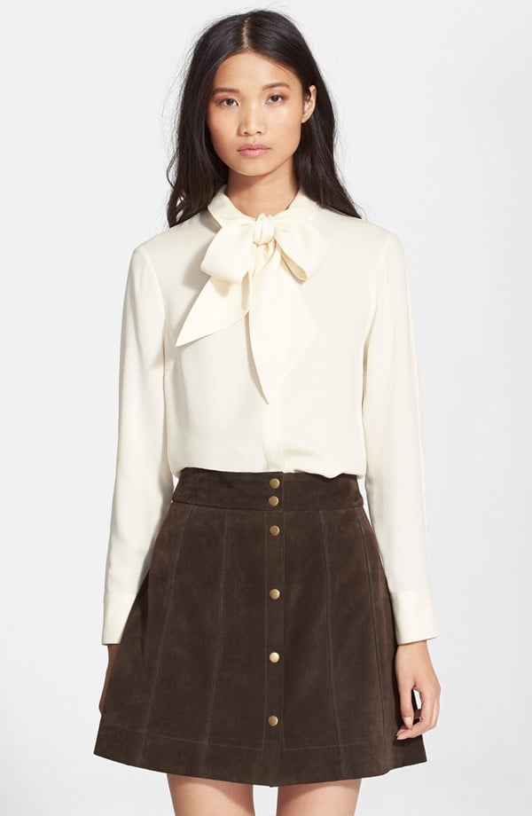 Like Caitlyn Jenner, I'm obsessed with front-tie shirts, like this one by Frame Denim ($268). They just seem so polished and feminine, and I finally have a neck-embellished style to cure my bandana addiction.
— SS