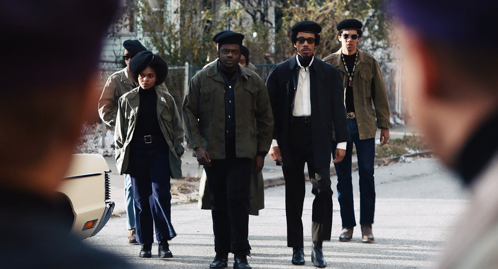 JUDAS AND THE BLACK MESSIAH, from left: Ashton Sanders, as Jimmy Palmer (back), Dominique Thorne, as Judy Harmon, Daniel Kaluuya, as Chairman Fred Hampton, Darrell Britt-Gibson, as Bobby Rush, Caleb Eberhardt, as Bob Lee, 2021.   Warner Bros. / Courtesy Everett Collection